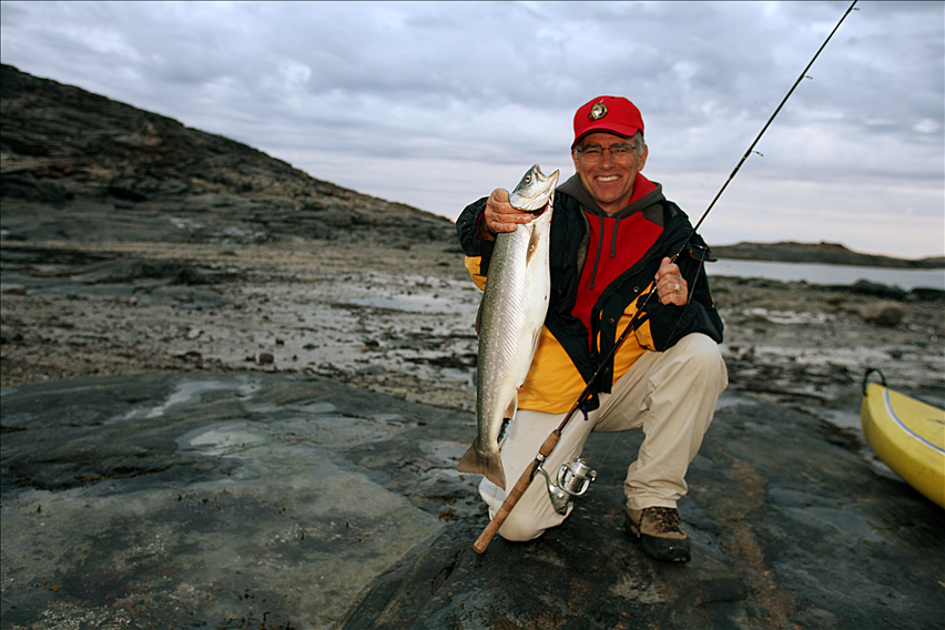 Two Cambridge Bay youth fishing off the dock, got lucky an…